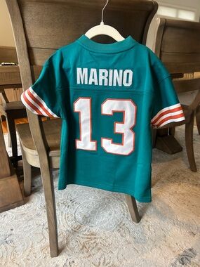 Mitchell & Ness Teal Kids Marino #13 Football Jersey with White & Orange Accents